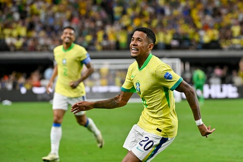 Savinho celebrates scoring Brazil's second goal